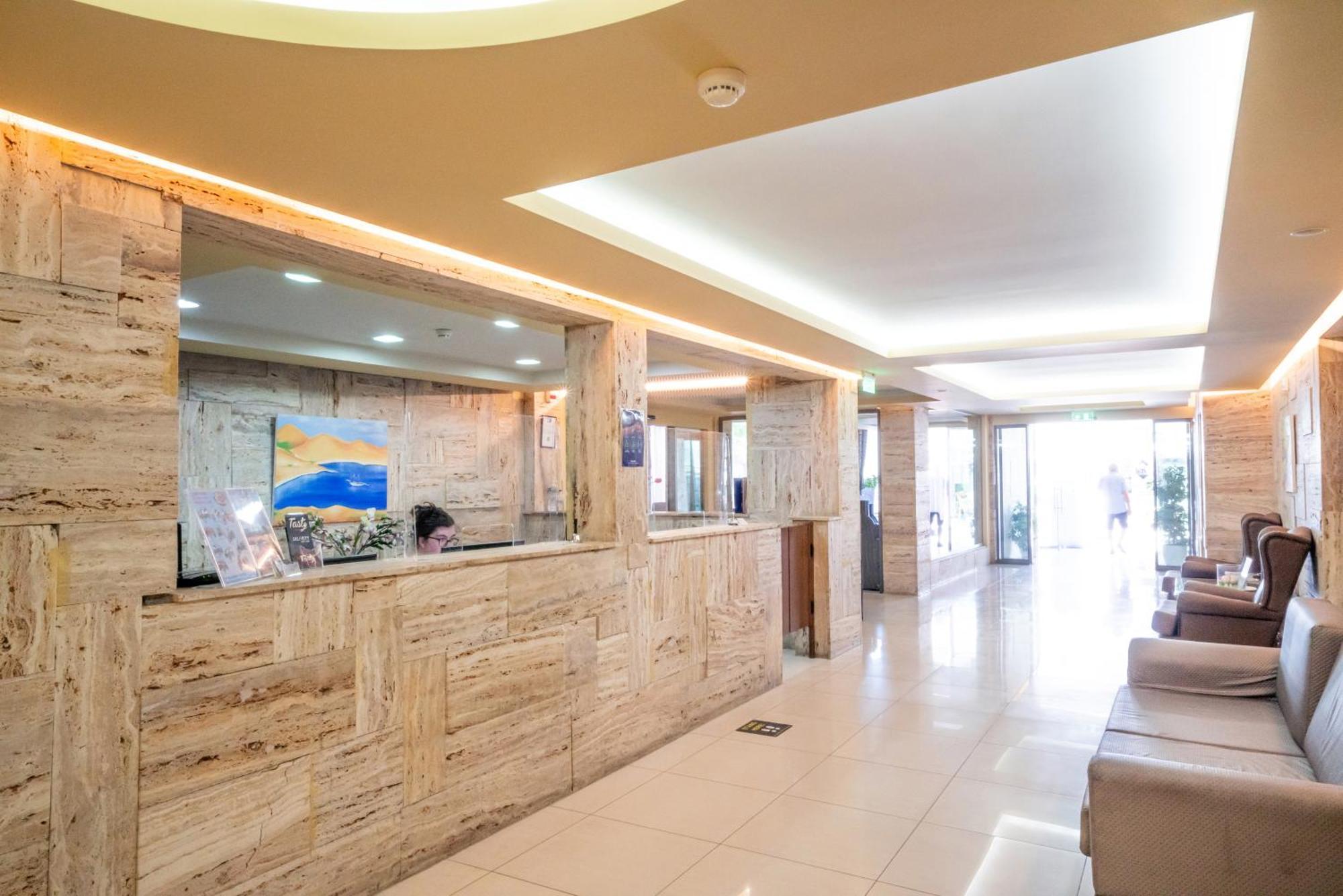 Hotel Olympion Потос Екстериор снимка