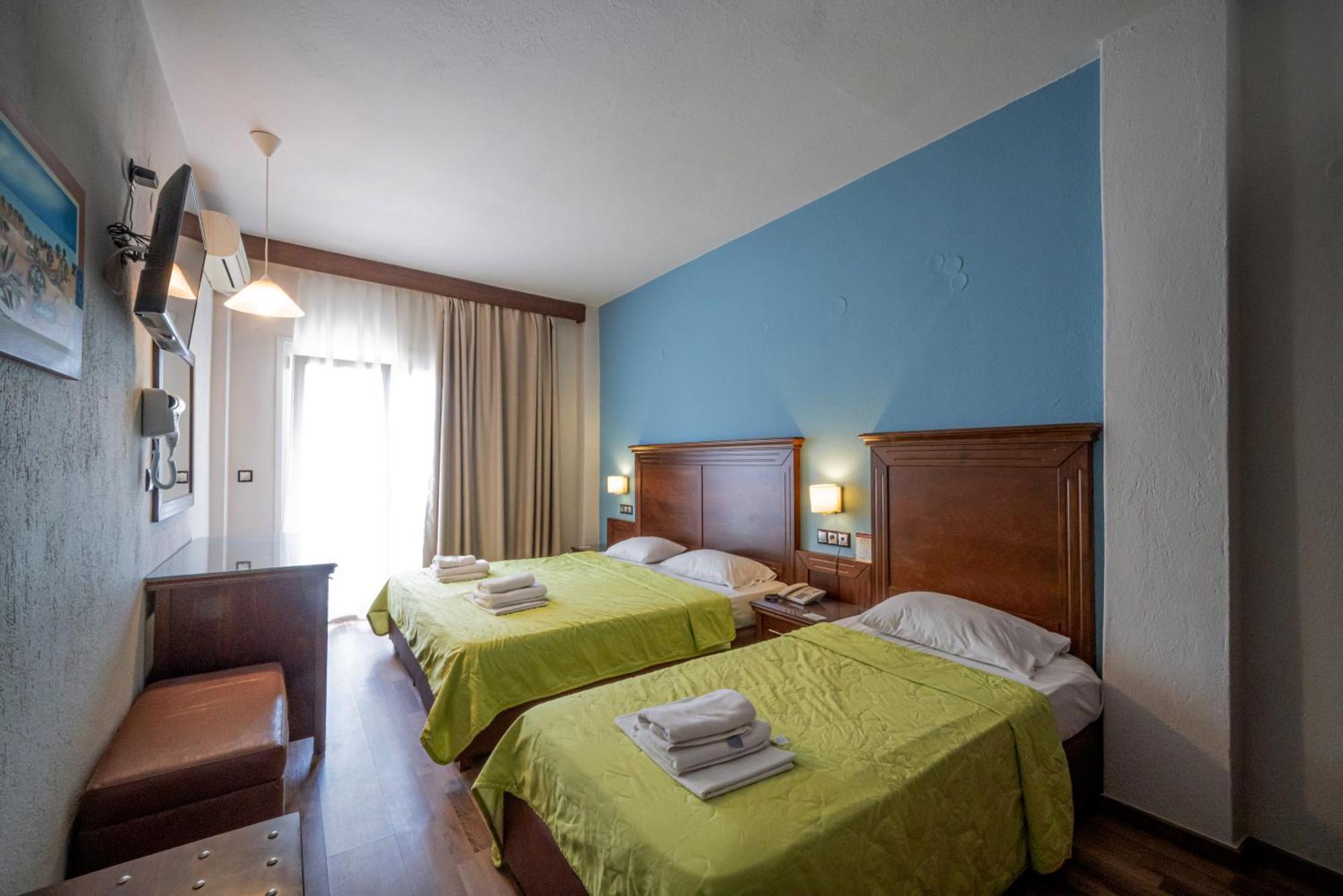 Hotel Olympion Потос Екстериор снимка